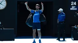 Novak Djokovic acknowledges the crowd as he leaves the court after retiring from the Australian Open against Alexander Zverev.
