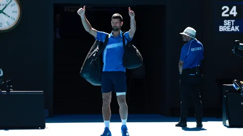 Novak Djokovic acknowledges the crowd as he leaves the court after retiring from the Australian Open against Alexander Zverev.