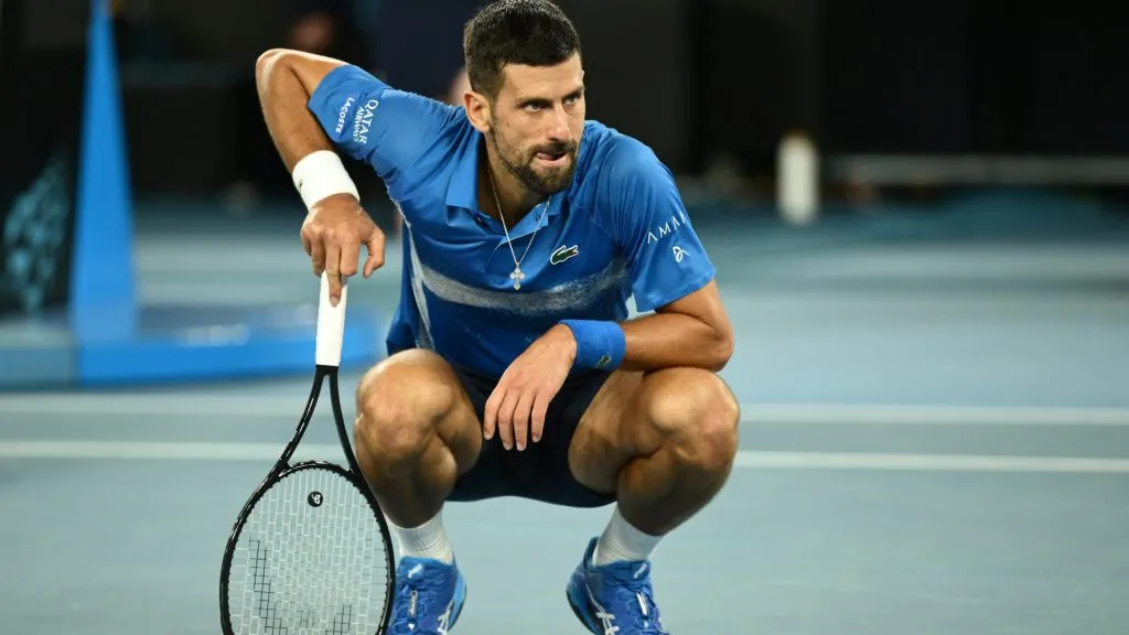 Novak Djokovic of Serbia reacts against Carlos Alcaraz during Australian Open. (Hannah Peters/Getty Images)
