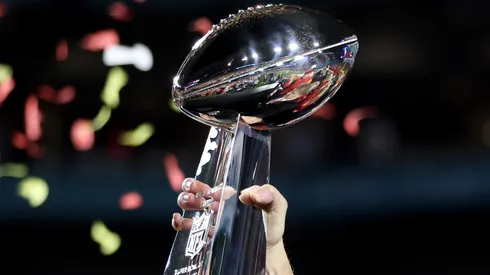 Kansas City Chiefs CEO Clark Hunt celebrates with the the Vince Lombardi Trophy after defeating the Philadelphia Eagles 38-35 in Super Bowl LVII at State Farm Stadium on February 12, 2023 in Glendale, Arizona.