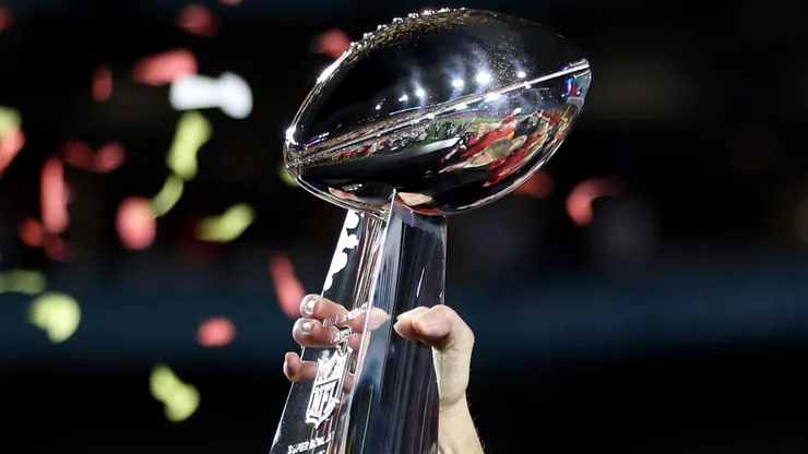 Kansas City Chiefs CEO Clark Hunt celebrates with the the Vince Lombardi Trophy after defeating the Philadelphia Eagles 38-35 in Super Bowl LVII at State Farm Stadium on February 12, 2023 in Glendale, Arizona.