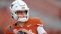 Arch Manning #16 of the Texas Longhorns warms up prior to a game against the Clemson Tigers in the Playoff First Round Game at Darrell K Royal-Texas Memorial Stadium on December 21, 2024 in Austin, Texas.