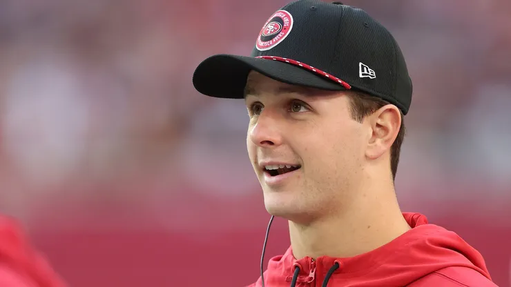 Brock Purdy #13 of the San Francisco 49ers looks on from the sidelines during the second quarter against the Arizona Cardinals at State Farm Stadium on January 05, 2025 in Glendale, Arizona.