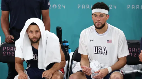 Players from Team United States watch from the bench during the Men's Gold Medal game between Team France and Team United States