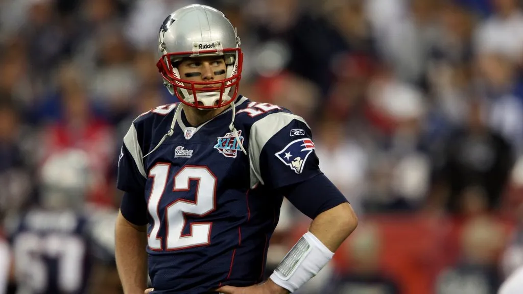 Quarterback Tom Brady #12 of the New England Patriots looks on during Super Bowl XLII against the New York Giants on February 3, 2008. (Source: Andy Lyons/Getty Images)