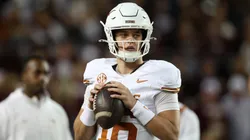 Arch Manning #16 of the Texas Longhorns warms up before the game against the Texas A&M Aggies at Kyle Field on November 30, 2024 in College Station, Texas.