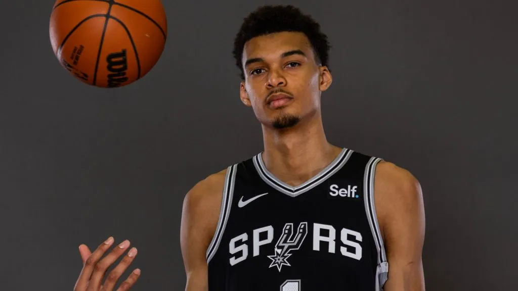 Victor Wembanyama #1 of the San Antonio Spurs poses for a portrait during the 2023 NBA rookie photo shoot at UNLV on July 12, 2023. (Source: Jamie Squire/Getty Images)