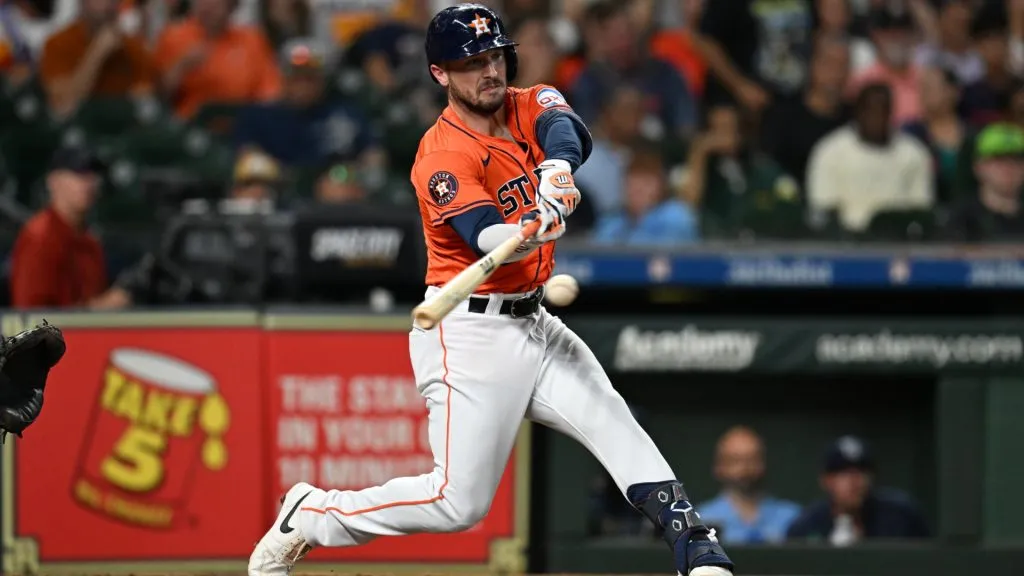 Alex Bregman #2 of the Houston Astros hits an infield single against the Tampa Bay Rays during the third inning at Minute Maid Park on August 2, 2024 in Houston, Texas. (Photo by Jack Gorman/Getty Images)