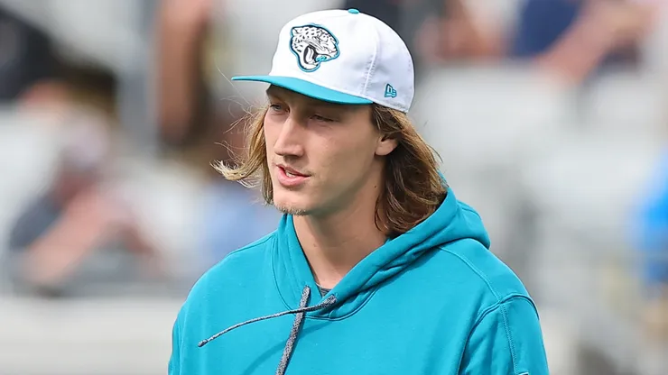 Shahid Khan, owner of the Jacksonville Jaguars, talks with Trevor Lawrence #16 before the game against the New York Jets at EverBank Stadium on December 15, 2024 in Jacksonville, Florida.