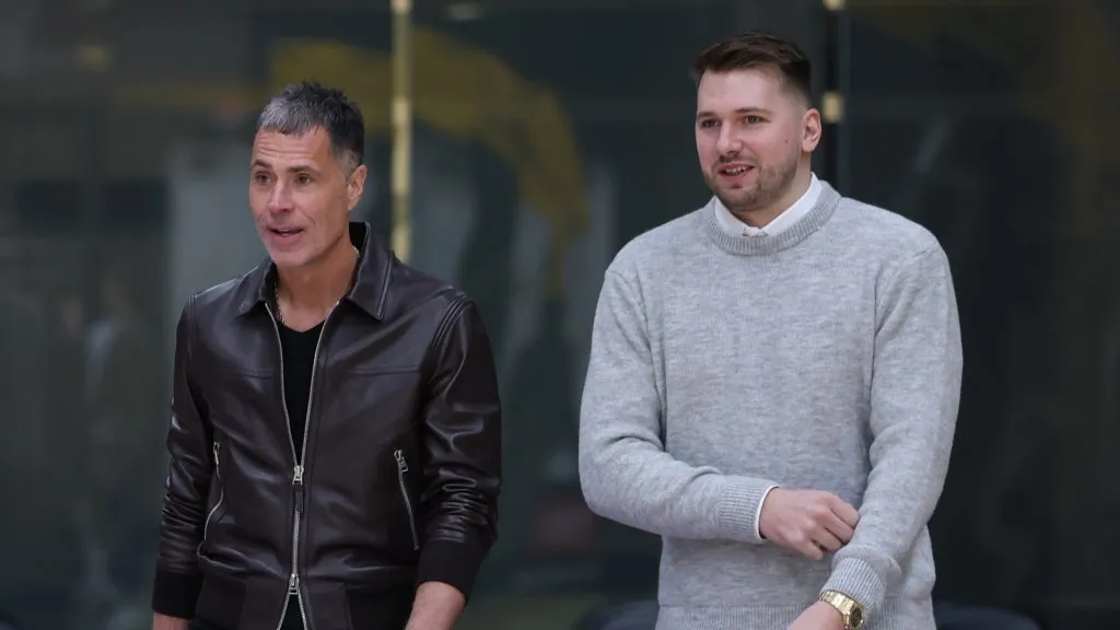 Doncic and Pelinka arriving to the press conference