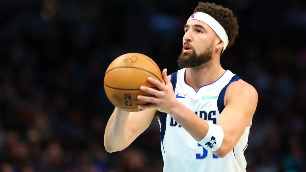 Klay Thompson #31 of the Dallas Mavericks shoots the ball during the first half of a basketball game against the Charlotte Hornets at Spectrum Center. (David Jensen/Getty Images)