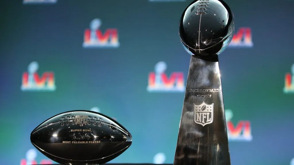 The Pete Rozelle Trophy given to the Super Bowl MVP, and the Vince Lombardi Trophy are seen during the Super Bowl LVI head coach and MVP press conference in 2022. (Source: Katelyn Mulcahy/Getty Images)