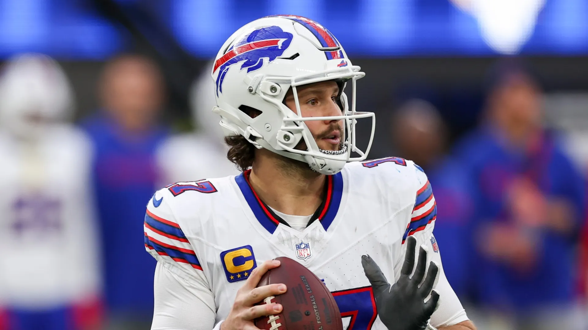 Josh Allen attempting to throw a pass.