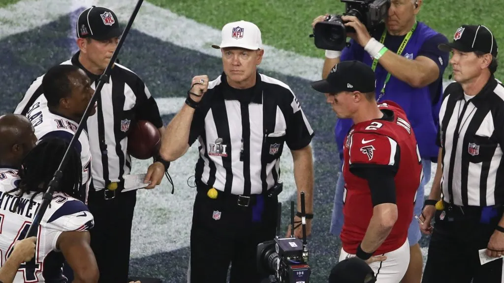 Matt Ryan awaits the overtime coin toss with Dont’a Hightower during Super Bowl 51.