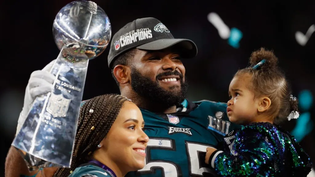 Brandon Graham #55 of the Philadelphia Eagles with his wife Carlyne and daughter Emerson Abigail after his teams 41-33 victory over the New England Patriots in Super Bowl LII. (Source: Kevin C. Cox/Getty Images)