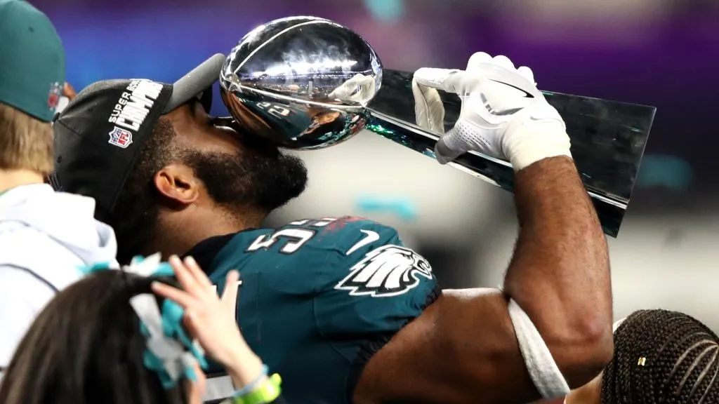 Brandon Graham #55 of the Philadelphia Eagles kisses the Lombardi trophy after defeating the New England Patriots 41-33 in Super Bowl LII. (Source: Gregory Shamus/Getty Images)
