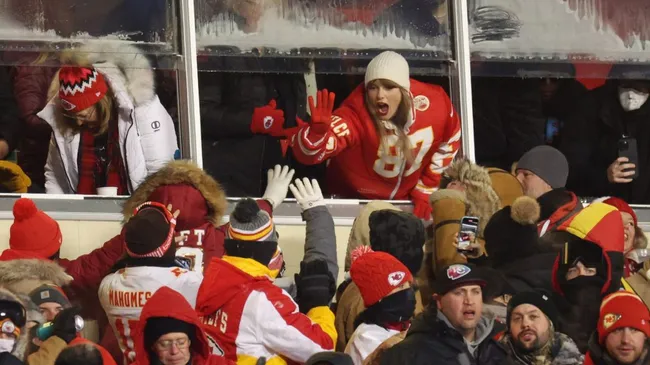 Taylor celebrates with fans during the AFC Wild Card Playoffs between the Miami Dolphins&nbsp;(Jamie Squire/Getty Images)
