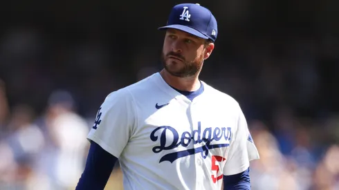 Ryan Brasier #57 of the Los Angeles Dodgers reacts as he plays the New York Mets at the end of the first inning during Game Two of the Championship Series at Dodger Stadium on October 14, 2024 in Los Angeles, California.