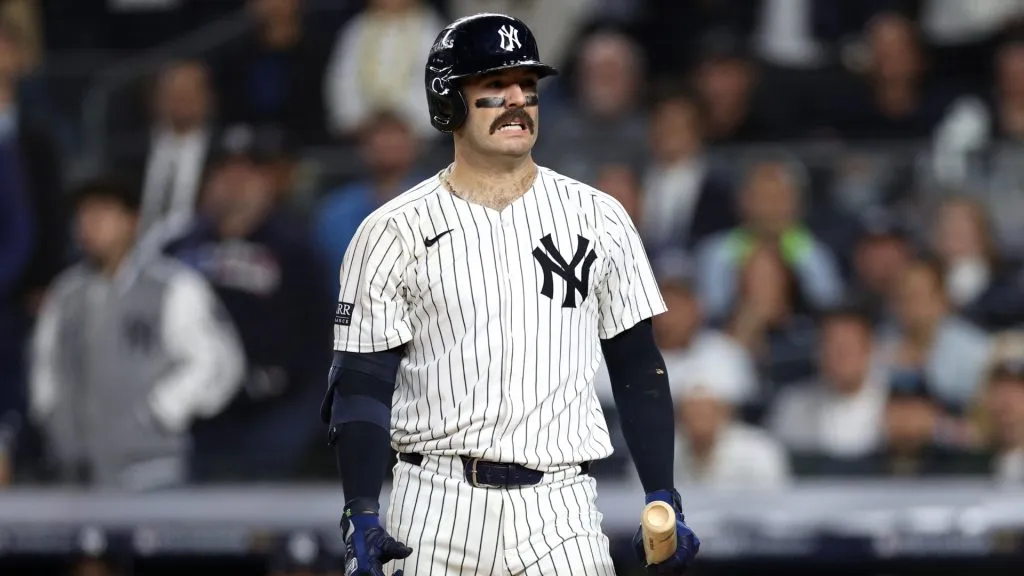 Jon Berti #19 of the New York Yankees reacts after striking out in the eighth inning against the Kansas City Royals during Game Two of the Division Series at Yankee Stadium on October 07, 2024 in New York City. (Photo by Elsa/Getty Images)