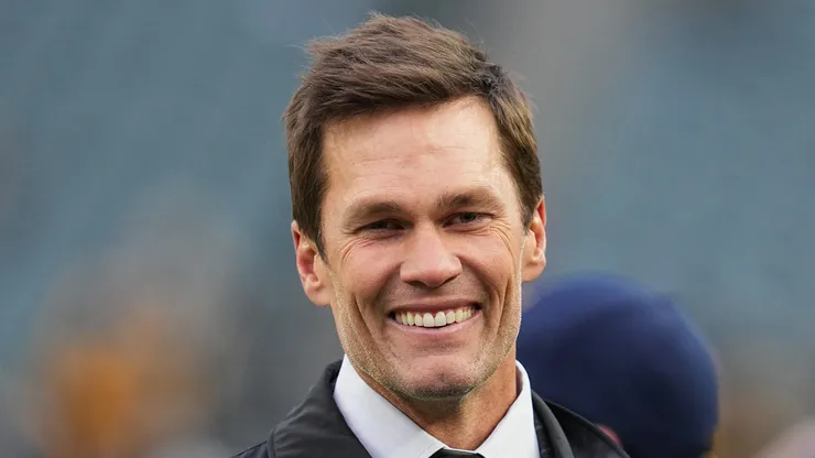 Tom Brady looks on from the field prior to an NFL football game between the Pittsburgh Steelers and the Philadelphia Eagles at Lincoln Financial Field on December 15, 2024 in Philadelphia, Pennsylvania.