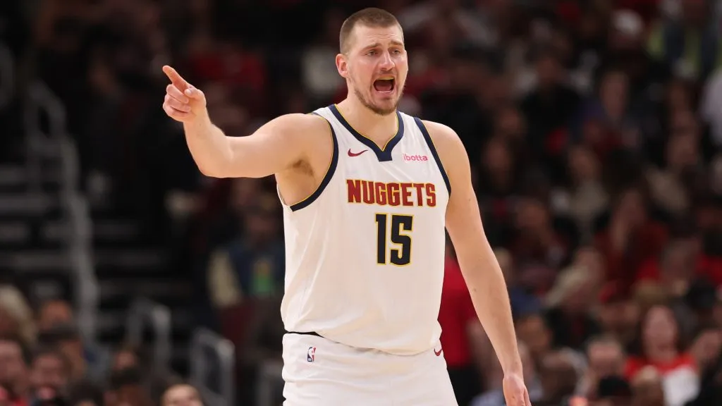Nikola Jokic #15 of the Denver Nuggets looks on against the Chicago Bulls during the first half at the United Center.
