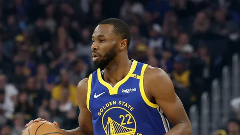 Andrew Wiggins #22 of the Golden State Warriors dribbles the ball against the Phoenix Suns