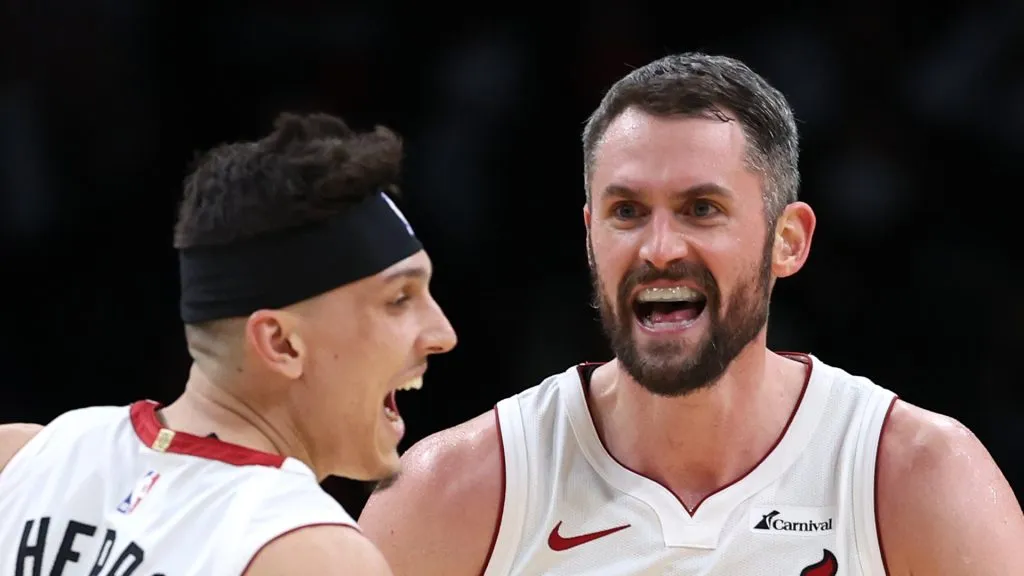 Kevin Love #42 of the Miami Heat celebrates with teammate Tyler Herro #14 against the Washington Wizards