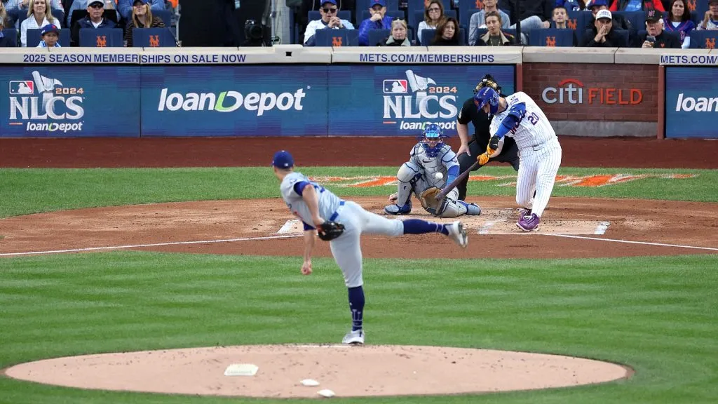 Pete Alonso #20 of the New York Mets hits a three-run home run against Jack Flaherty #0 of the Los Angeles Dodgers in the first inning during Game Five of the National League Championship Series at Citi Field on October 18, 2024 in New York City. (Photo by Luke Hales/Getty Images)