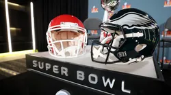 A Kansas City Chiefs helmet, the Vince Lombardi Trophy and a Philadelphia Eagles helmet are seen before the NFL Commissioner Roger Goodell's Super Bowl Press Conference ahead of Super Bowl LIX.