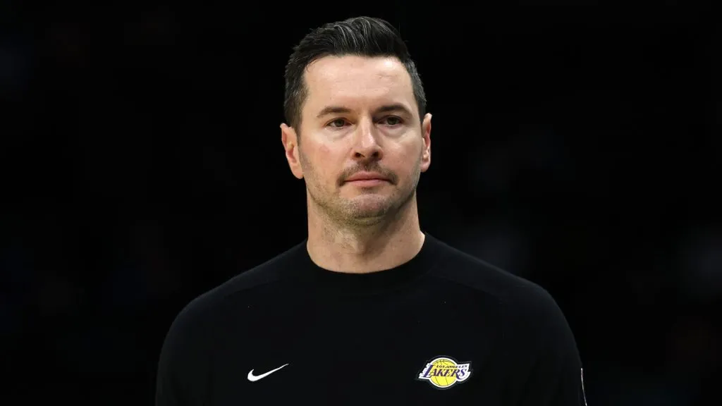 Head coach JJ Redick of the Los Angeles Lakers looks on during the first half of the game against the Charlotte Hornets at Spectrum Center.