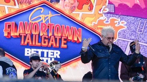 Guy Fieri onstage at Guy Fieri's Flavortown Tailgate on February 11, 2024.