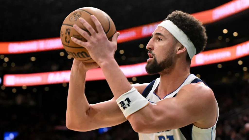 Klay Thompson #31 of the Dallas Mavericks attempts a three-point basket against the Boston Celtics during the first quarter at the TD Garden. (Brian Fluharty/Getty Images)
