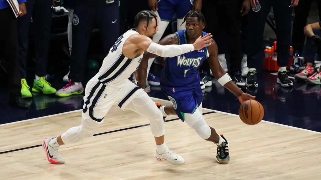 Anthony Edwards #1 of the Minnesota Timberwolves dribbles the ball while Dillon Brooks #24 of the Memphis Grizzlies defends. (David Berding/Getty Images)