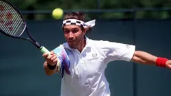 Pat Cash hits the ball during the 1990 Wimbledon.