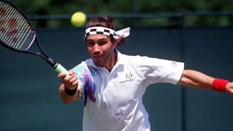 Pat Cash hits the ball during the 1990 Wimbledon.
