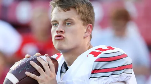 Joe Burrow #10 of the Ohio State Buckeyes warms up prior to the game against the Oklahoma Sooners at Gaylord Family Oklahoma Memorial Stadium on September 17, 2016 in Norman, Oklahoma.