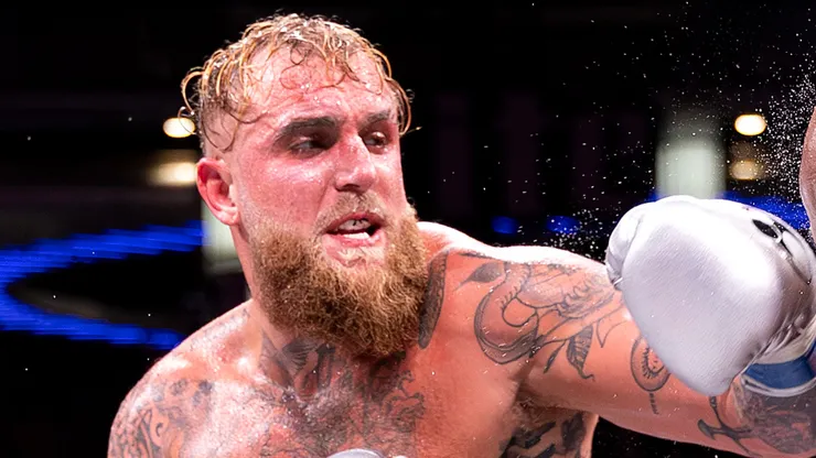 Jake Paul punches Mike Tyson during LIVE On Netflix: Jake Paul vs. Mike Tyson at AT&T Stadium on November 15, 2024 in Arlington, Texas.