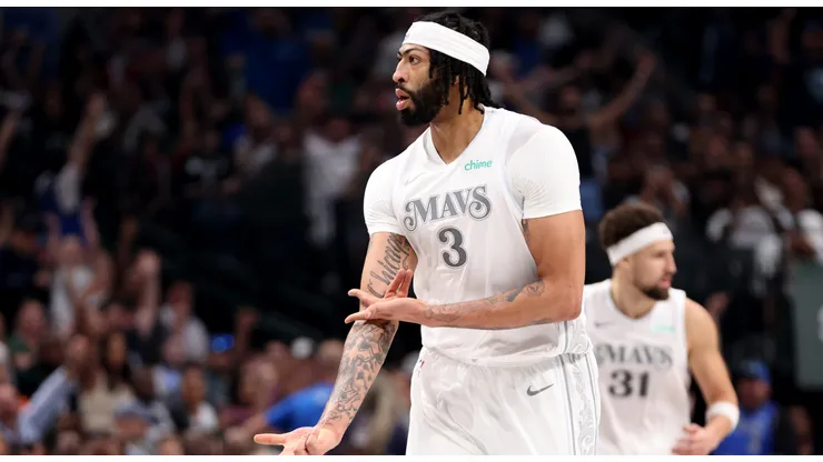 : Anthony Davis #3 of the Dallas Mavericks reacts after making a three point basket against the Houston Rockets during the first quarter at American Airlines Center on February 08, 2025 in Dallas, Texas.