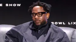 Kendrick Lamar walks onstage during the Super Bowl LVIX Pregame & Apple Music Super Bowl LVIX Halftime Show Press Conference at Ernest N. Morial Convention Center on February 06, 2025.