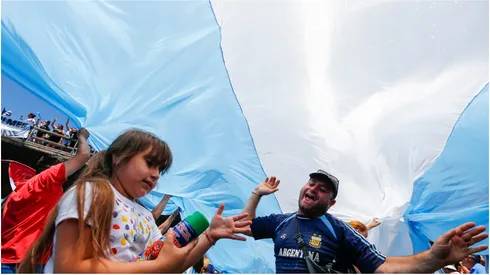 A fan of Argentina with flag