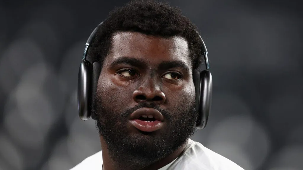 EAST RUTHERFORD, NEW JERSEY – NOVEMBER 06: Mekhi Becton #77 of the New York Jets warms up before the game against the Los Angeles Chargers at MetLife Stadium on November 06, 2023 in East Rutherford, New Jersey. (Photo by Elsa/Getty Images)