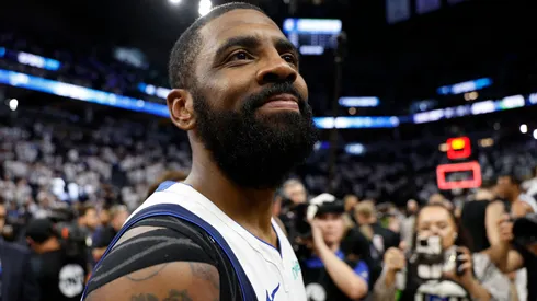 Kyrie Irving #11 of the Dallas Mavericks celebrates after a 124-103 victory against the Minnesota Timberwolves in Game Five of the Western Conference Finals at Target Center on May 30, 2024 in Minneapolis, Minnesota.