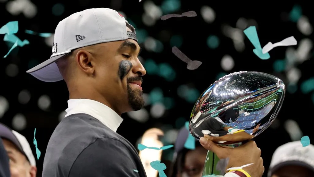 NEW ORLEANS, LOUISIANA - FEBRUARY 09: Jalen Hurts #1 of the Philadelphia Eagles celebrates with the Vince Lombardi Trophy after defeating the Kansas City Chiefs 40-22 to win Super Bowl LIX at Caesars Superdome on February 09, 2025 in New Orleans, Louisiana.
