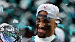 Jalen Hurts #1 of the Philadelphia Eagles celebrates with the Vince Lombardi Trophy after beating the Kansas City Chiefs 40-22 to win Super Bowl LIX