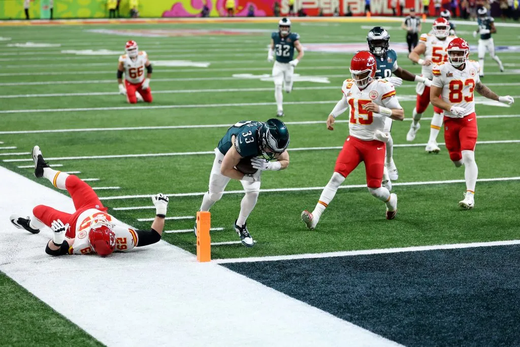 NEW ORLEANS, LOUISIANA – FEBRUARY 09: Cooper DeJean #33 of the Philadelphia Eagles scores a touchdown past Patrick Mahomes #15 of the Kansas City Chiefs after making an interception in the second quarter during Super Bowl LIX at Caesars Superdome on February 09, 2025 in New Orleans, Louisiana. (Photo by Emilee Chinn/Getty Images)