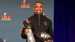 Quarterback Jalen Hurts #1 of the Philadelphia Eagles, the MVP of Super Bowl LIX, holds both the MVP and Vince Lombardi trophies during a press conference at the Ernest N. Morial Convention Center on February 10, 2025 in New Orleans, Louisiana.