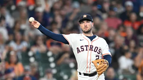 Alex Bregman #2 of the Houston Astros throws to first base against the Arizona Diamondbacks during the third inning at Minute Maid Park on September 07, 2024 in Houston, Texas.