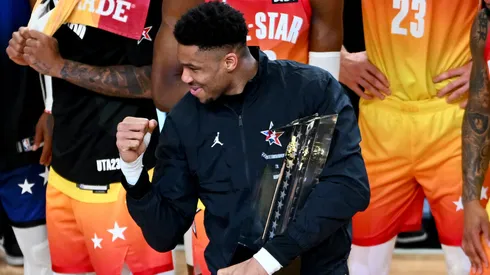 Giannis Antetokounmpo #34 of the Milwaukee Bucks celebrates a win while holding the All Star Game trophy after the 2023 NBA All Star Game between Team Giannis and Team LeBron at Vivint Arena on February 19, 2023 in Salt Lake City, Utah.