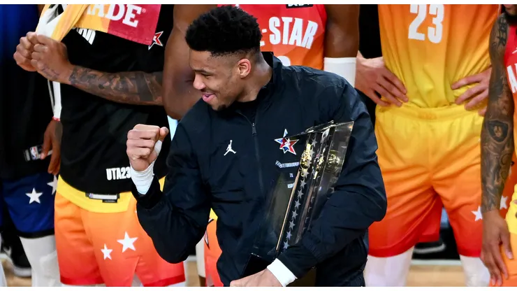 Giannis Antetokounmpo #34 of the Milwaukee Bucks celebrates a win while holding the All Star Game trophy after the 2023 NBA All Star Game between Team Giannis and Team LeBron at Vivint Arena on February 19, 2023 in Salt Lake City, Utah.
