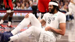 Anthony Davis #3 of the Dallas Mavericks reacts after an injury in the game against the Houston Rockets at American Airlines Center on February 08, 2025 in Dallas, Texas.